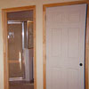 Interior door installation, base trim work and window replacement