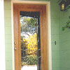 Custom wood entry door with antique leaded and beveled glass