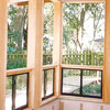 Custom carpentry to enclose open porch with aluminum windows